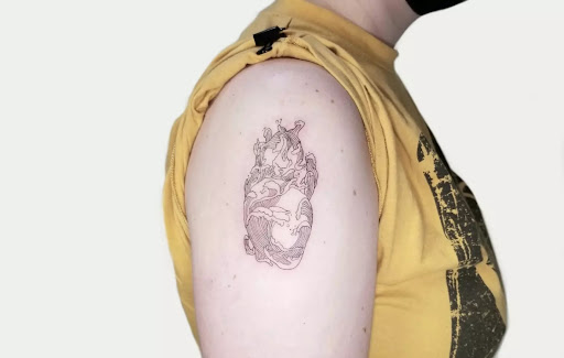 Explore race car tattoo ideas, creative tattoo ideas in Sunnyvale, available at Greego tattoo