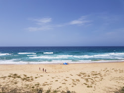 Zdjęcie Aragunnu Beach z powierzchnią niebieska czysta woda