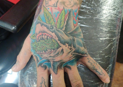 Explore above knee tattoo ideas, creative tattoo ideas in Colorado Springs, available at Hot Rod Tattoos and Body Piercing