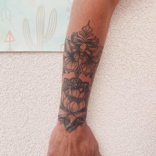 Explore karol g tattoo ideas, creative tattoo ideas in Florissant, available at Lone Jack Tattoo Company