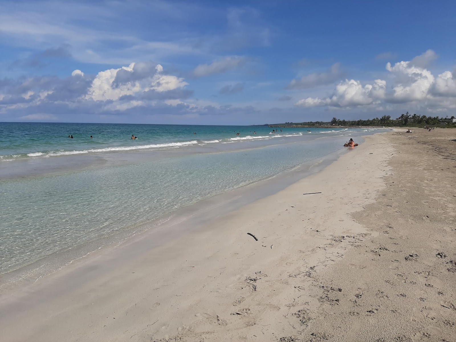 Photo of Guanabo beach with turquoise pure water surface