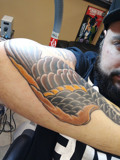 Explore palm sized tattoo ideas, creative tattoo ideas in Plantsville, available at Phoenix Ink Tattoo