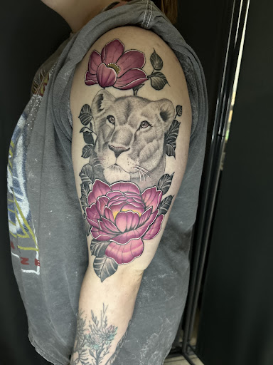 Explore traveler tattoo ideas, creative tattoo ideas in Lawrence, available at Skin Illustrations Tattoos & Piercings