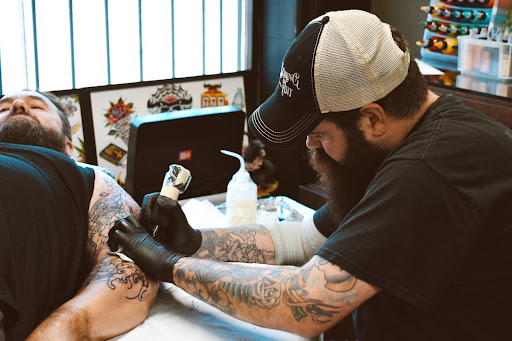 Explore line art tattoo ideas, creative tattoo ideas in Houston, available at Painstaking Art Tattoo Shop & Piercing