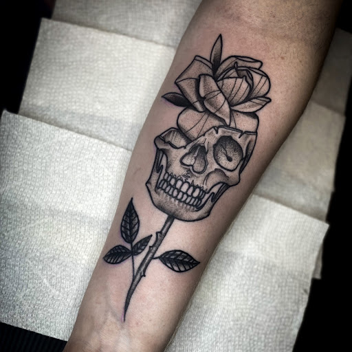 Explore rip tattoo ideas for mom, creative tattoo ideas in Elkview, available at Andy Electric Tattoos