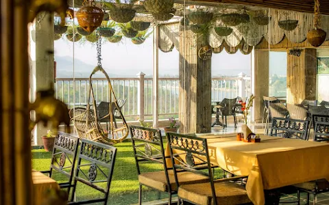 The Sitting Elephant - A Rooftop Restaurant Overlooking River Ganga image