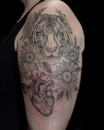 Explore tattoo ideas that represent family, creative tattoo ideas in Newtonville, available at Nirvana Tattoo Studio