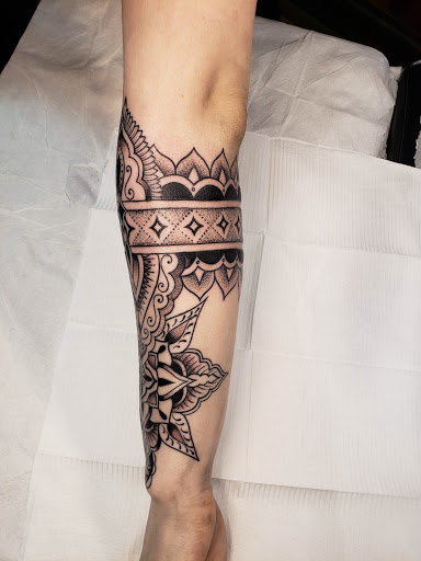 Explore face tattoos for men ideas, creative tattoo ideas in Glenside, available at Iron Will Tattoo Club
