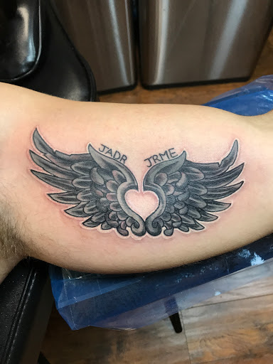 Explore viking tattoo ideas for men, creative tattoo ideas in Orlando, available at Good Vibrations Ink Tattoo and Body Piercing