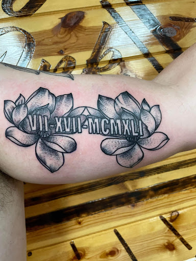 Explore half sleeve tattoos womens ideas, creative tattoo ideas in Foley, available at Symbolic Ink Tattoo Studio