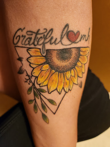 Explore fairy sleeve tattoo ideas, creative tattoo ideas in West Branch, available at Gray Goat Tattoo and Piercing