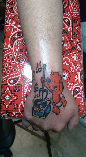 Explore knee cap tattoo ideas for men, creative tattoo ideas in Odessa, available at Evil Ink Tattoo