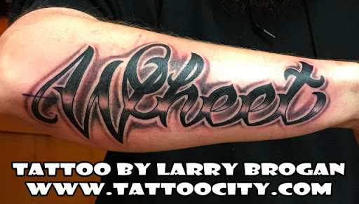 Explore behind the ear tattoo ideas for guys, creative tattoo ideas in Lockport, available at Tattoo City by Larry Brogan