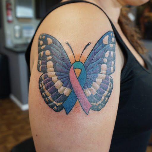 Explore crown tattoo ideas for guys, creative tattoo ideas in Oxnard, available at Downtown Tattoo & Body Piercing