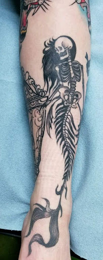 Explore arm tattoo ideas womens, creative tattoo ideas in Williston, available at Badlands Tattoo And Piercing