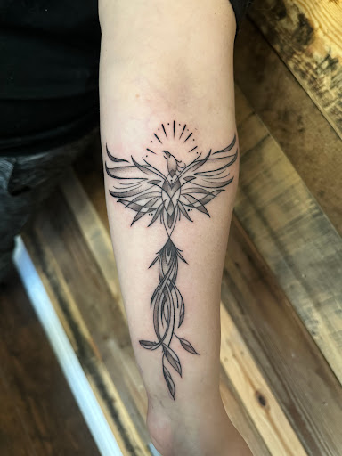 Explore highland cow tattoo ideas, creative tattoo ideas in Benson, available at Dark Matter Tattoo Studio