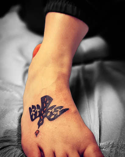 Explore meaningful full sleeve tattoo ideas, creative tattoo ideas in Lees Summit, available at The Cherry Bomb Tattoo Co.