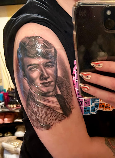 Find inbetween boob tattoo ideas for your next unique tattoo in Bethlehem at Electric Cheetah Tattoos And Permanent Cosmetics, llc.