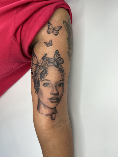 Explore trisomy 21 tattoo ideas, creative tattoo ideas in Roselle Park, available at Sola Ink