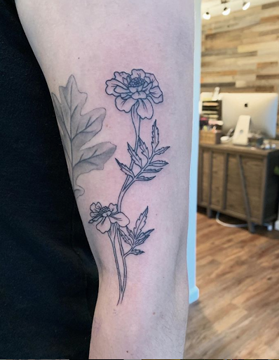 Explore dog bone tattoo ideas, creative tattoo ideas in Easthampton, available at Luckys Tattoo Studio