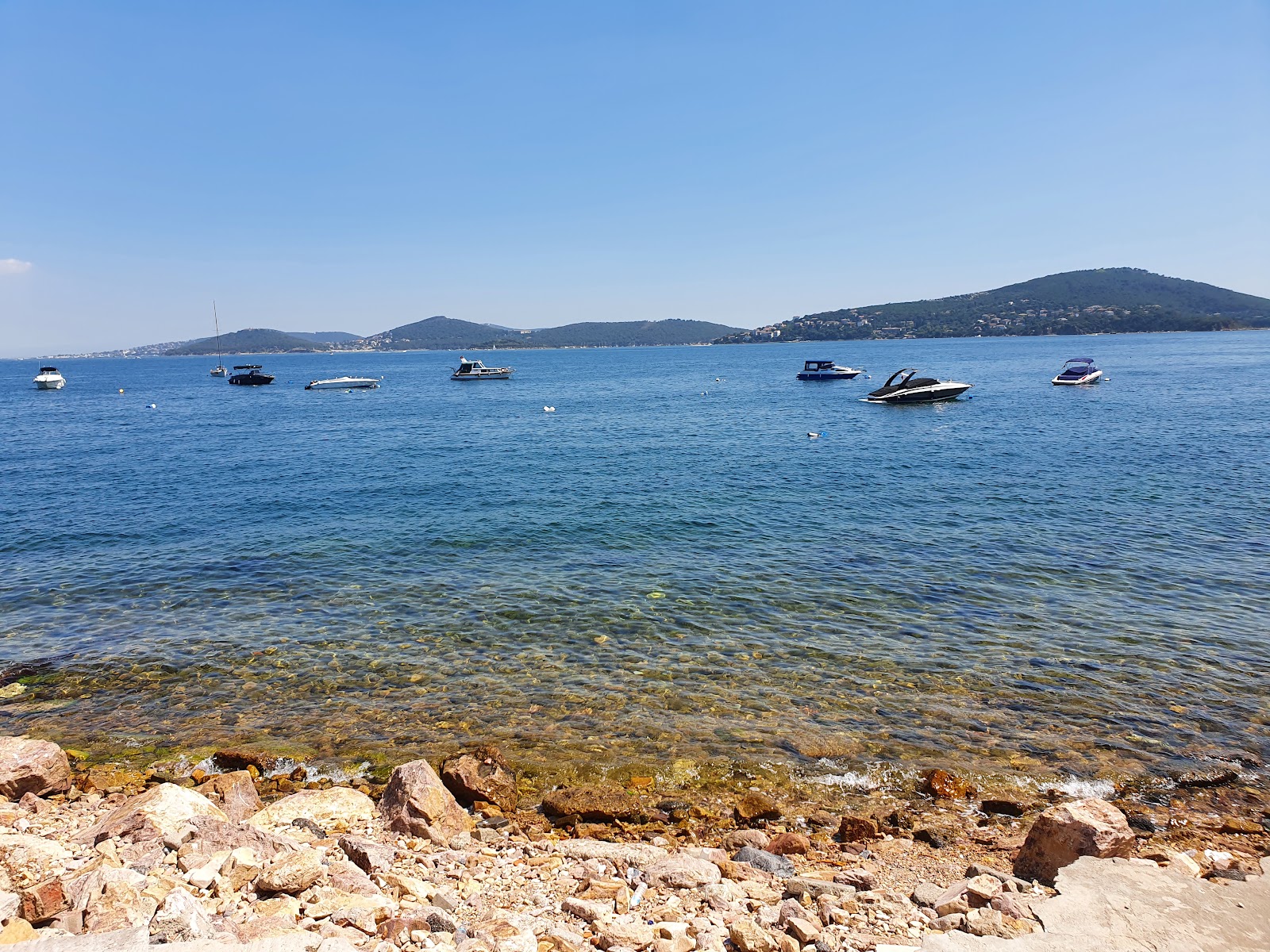 Onur Beach'in fotoğrafı düz bir kıyı şeridi ile birlikte