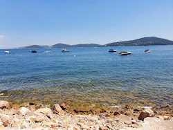Onur Beach'in fotoğrafı düz bir kıyı şeridi ile birlikte