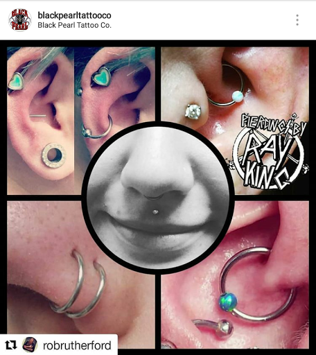 Explore red ink tattoo ideas, creative tattoo ideas in Clayton, available at Black Pearl Tattoo Company