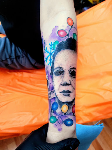 Explore love hate tattoo ideas, creative tattoo ideas in Benton, available at Spectrum Tattoo