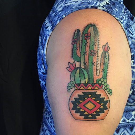 Explore bite me tattoo ideas, creative tattoo ideas in Sioux Falls, available at Tim Jewell Tattooer