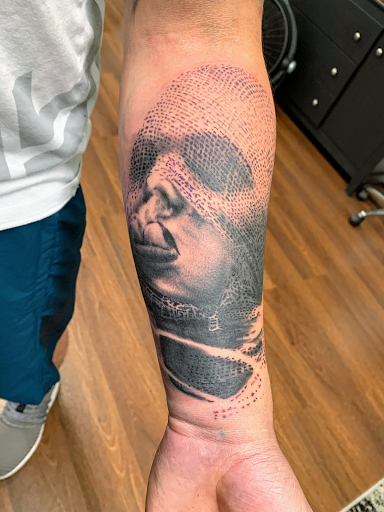 Explore mens filler tattoo ideas, creative tattoo ideas in Roscoe, available at Elevated Ink Tattoo