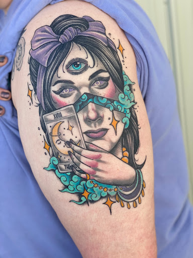 Explore mother son tattoos ideas, creative tattoo ideas in Oklahoma City, available at Black Magic Tattoo