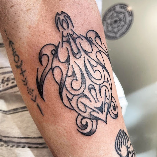 Explore rip tattoos ideas, creative tattoo ideas in Carbondale, available at Bonedale Tattoo