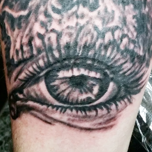 Explore good small tattoo ideas for guys, creative tattoo ideas in Erie, available at EliKingInk