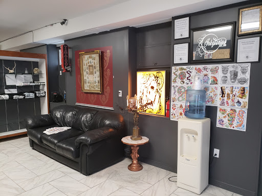 Explore cover up tattoo ideas back, creative tattoo ideas in Northampton, available at Inkglorious Custom Tattoo Studio