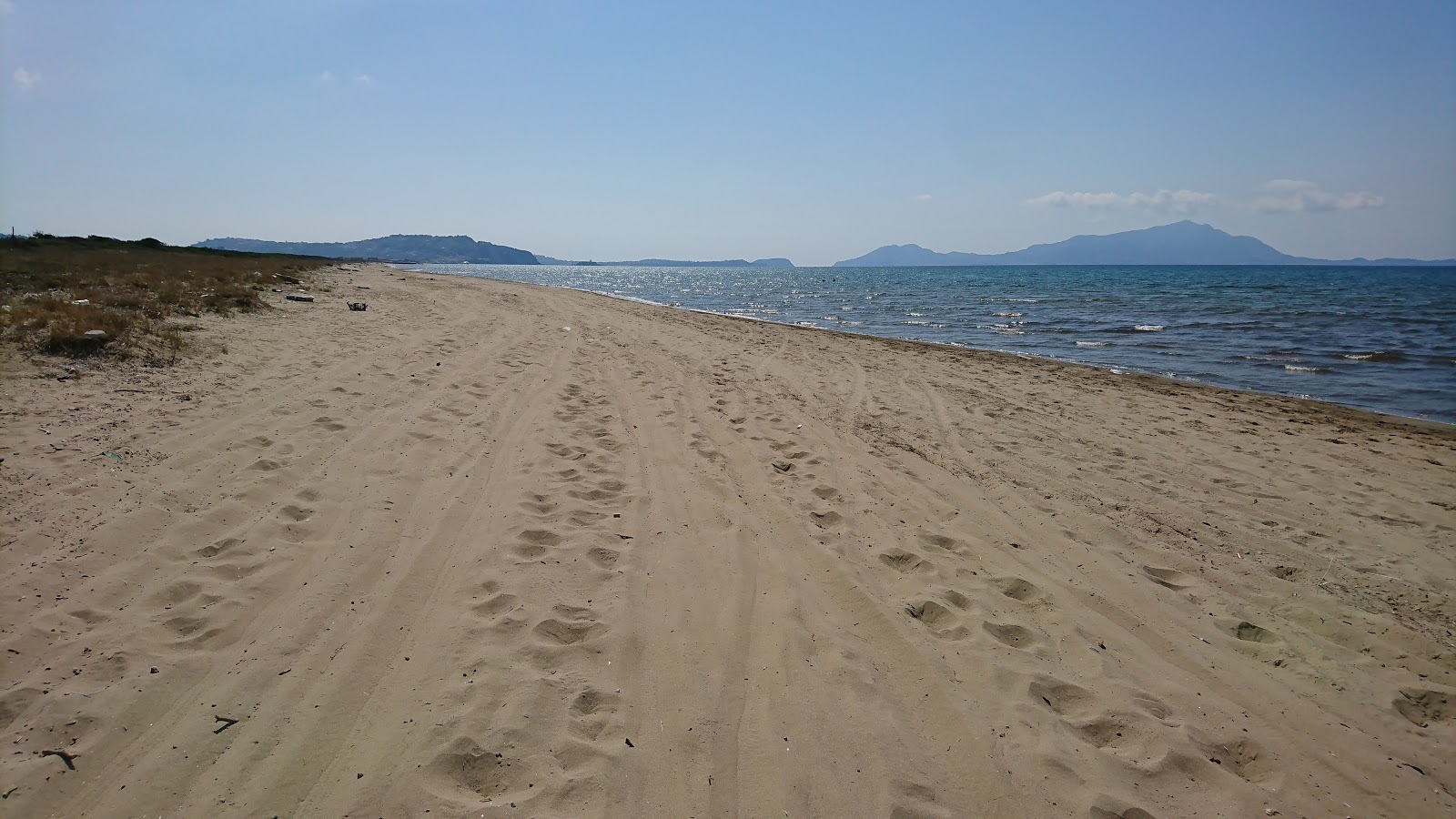 Foto av Spiaggia Romana med lång rak strand