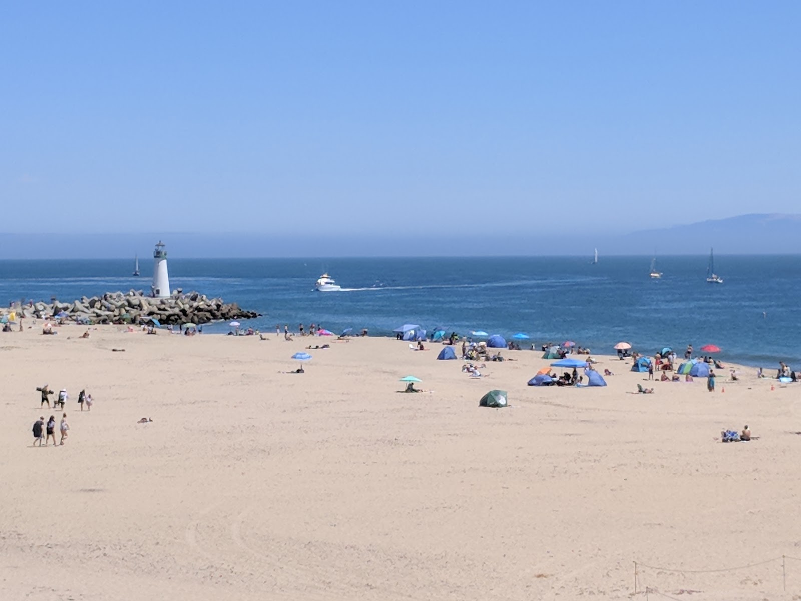 Foto von Seabright Beach mit türkisfarbenes wasser Oberfläche