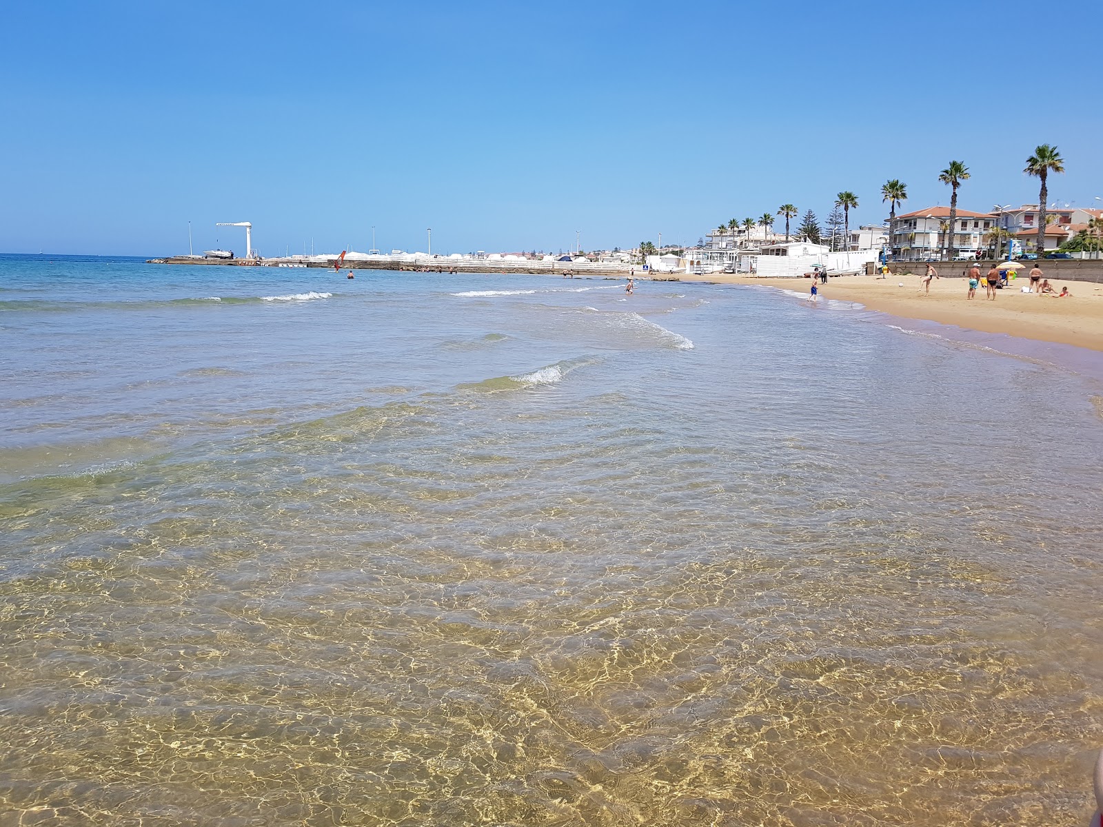 Foto van Marina di Ragusa met helder fijn zand oppervlakte