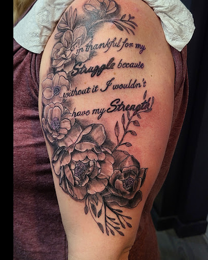 Explore tattoo over scar ideas, creative tattoo ideas in Cumberland, available at Queen City Ink