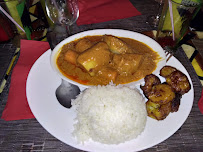 Poulet au curry du Restaurant de spécialités d'Afrique de l'Ouest Le Village à Paris - n°8