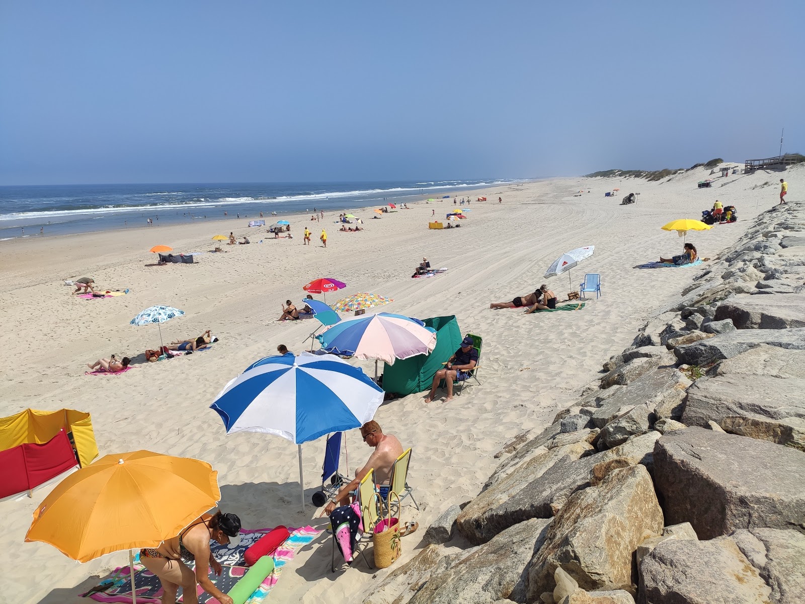 Foto van Praia da Vagueira met helder fijn zand oppervlakte