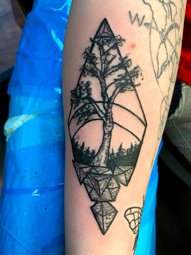 Explore leg tattoo ideas woman, creative tattoo ideas in Seymour, available at American Gypsy Tattoo Corp.