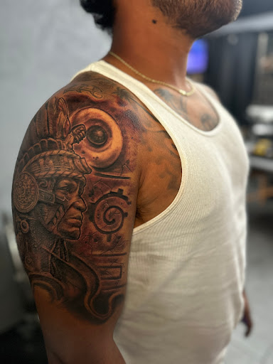 Explore snail tattoo ideas, creative tattoo ideas in Willis, available at Half Pint Tattoo Studio