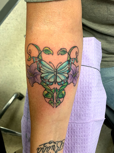 Explore foot tattoos ideas, creative tattoo ideas in Milford, available at Nomadic Roots Tattoo