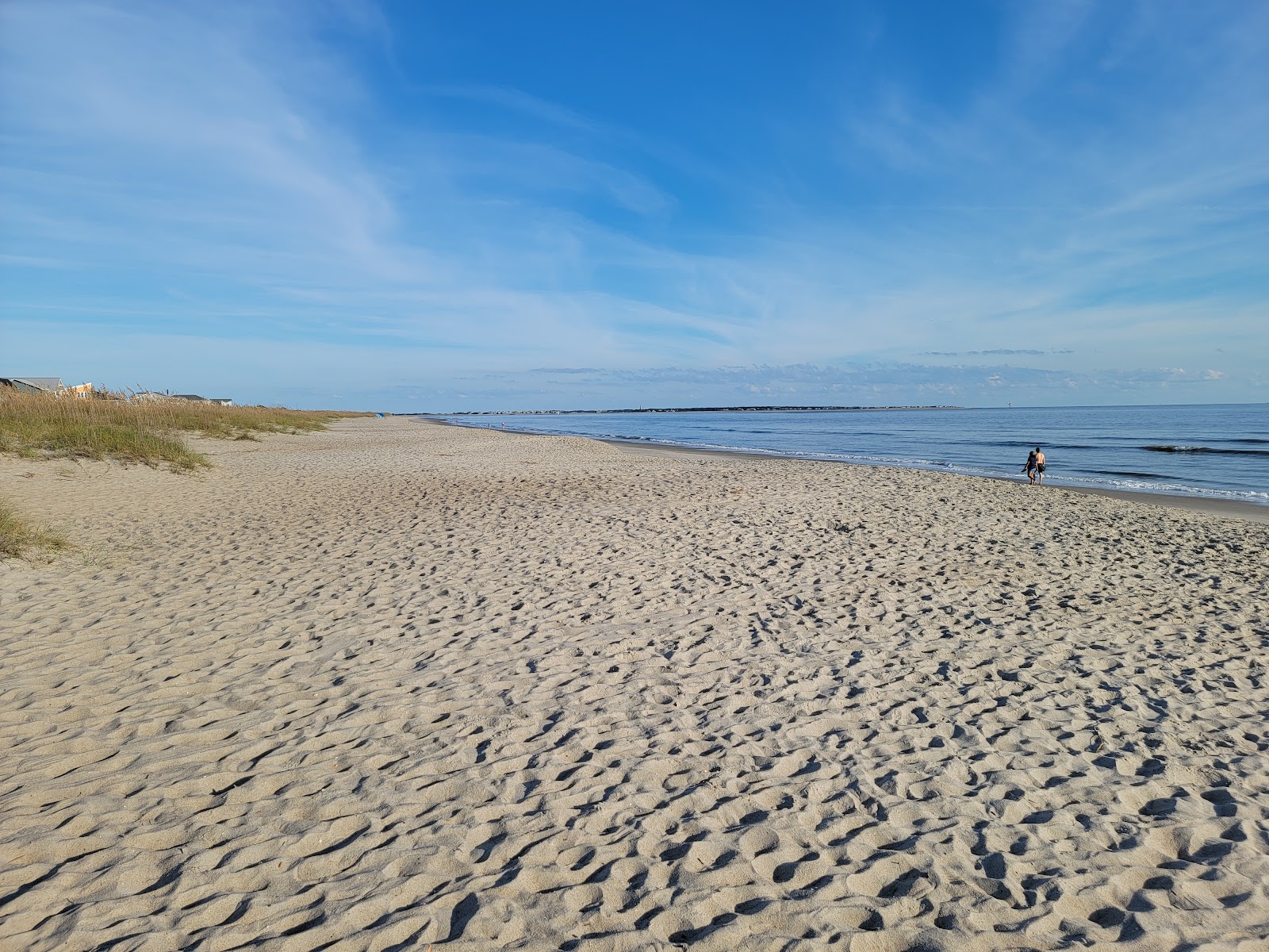 Fotografija Caswell beach z svetel pesek površino
