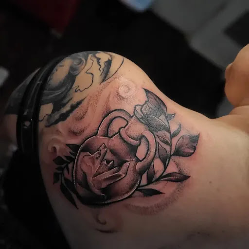 Explore thigh hip tattoo ideas, creative tattoo ideas in Valdosta, available at Acid Ink Tattoos