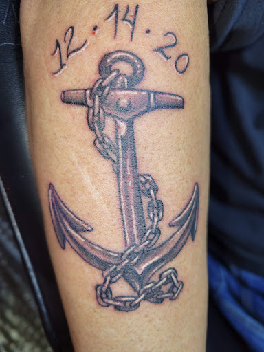 Explore meaningful first tattoo ideas, creative tattoo ideas in Angola, available at Hoodlum Ink