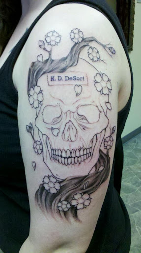 Find women's rib tattoo ideas for your next unique tattoo in Coeur D Alene at Jojos Tattoo & Body Piercing