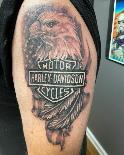 Explore collarbone tattoo ideas for men, creative tattoo ideas in Shelbyville, available at Stage Left Tattoo and Piercing