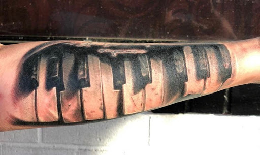 Explore chest plate tattoo ideas, creative tattoo ideas in Avon, available at Avanti Tattoo