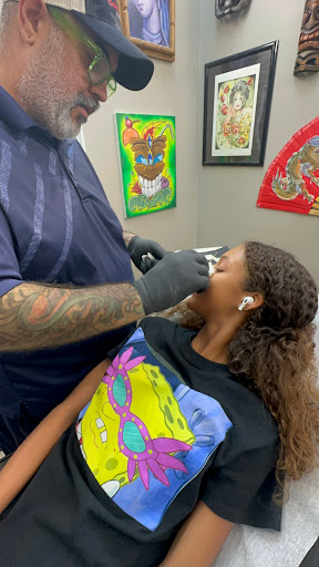 Explore mens throat tattoo ideas, creative tattoo ideas in Lutz, available at Studio 54 Tattoo